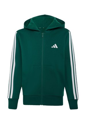 Ciemnozielona bluza z kapturem i zamkiem błyskawicznym, z białymi trzema paskami na rękawach, kieszeniami z przodu i białym logo Adidas na piersi.