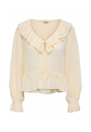 Kremfarget bluse med lange ermer, teksturerte polkaprikker, rysjekrage og mansjetter, knyting foran på halsen og peplumkant.