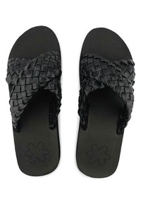 Black slides with a woven strap design, made of synthetic material. Textured sole with small flower pattern. Light and minimalistic style.
