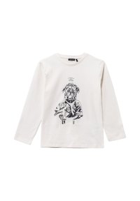 T-shirt a maniche lunghe in cotone crema con una stampa grafica nera di un cane in divisa, con dettagli sul cane stampati sopra.