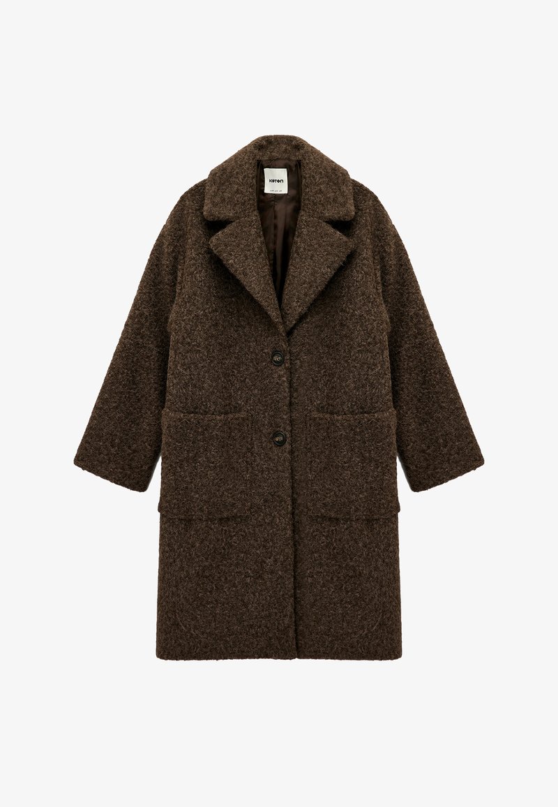 Abrigo de lana marrón con una superficie texturizada, cuello con muescas, dos bolsillos frontales y cierre de botones. Diseñado en un estilo oversized de longitud hasta la rodilla.