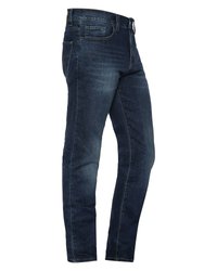 Granatowe dżinsy o wąskim kroju, z pięcioma kieszeniami, kontrastowym przeszyciem i wyblakłym wykończeniem na udach.