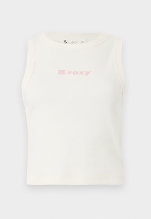 Bela rebrasta majica bez rukava z okroglim izrezom in majhnim roza logotipom "Roxy" na prsih. Gladka tekstura, oprijet kroj.