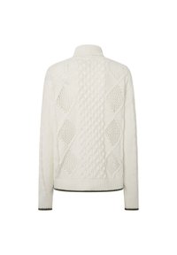 Baltas megztinis su aukštu apykakle, puošiamas tekstūruotais kabelių ir deimantų raštais. Raukšlėtos rankogaliai ir apvadas turi kontrastingą tamsią briauną.