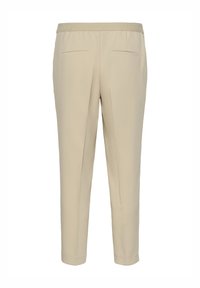 Pantalons évasés beige avec une taille élastique, deux poches arrière, texture lisse et un design propre et structuré.