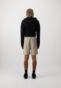 Jack & Jones JPSTJAIDEN JJJACQUARD - Kratke hlače - cloud dancer