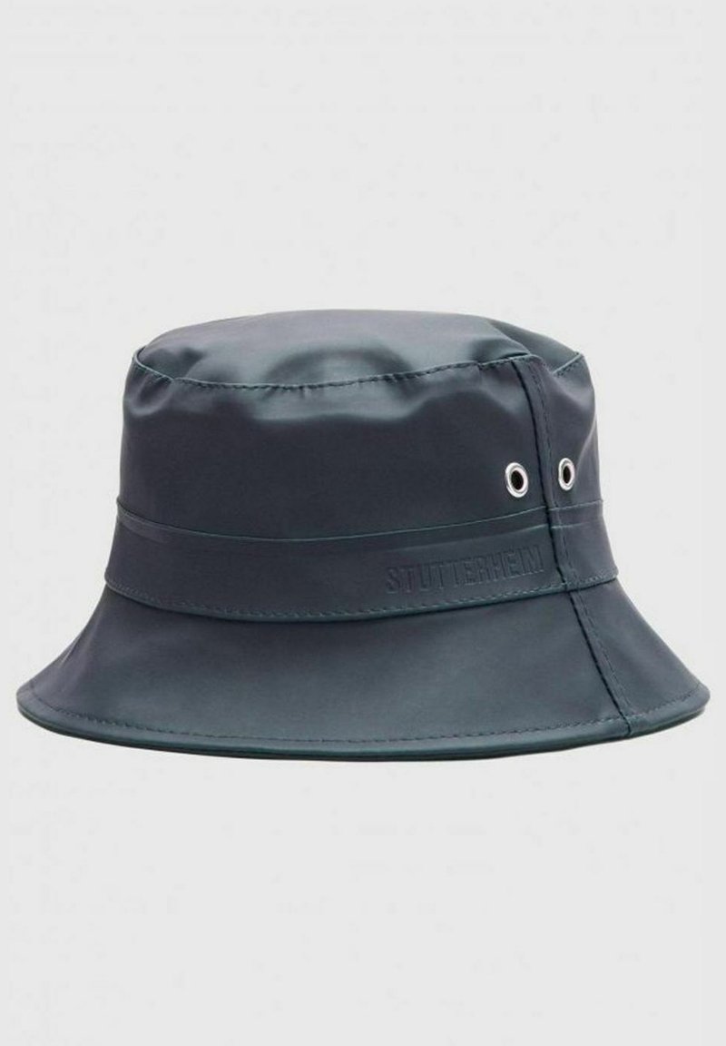 Navyblauer Bucket Hat aus wasserdichtem Material. Merkmale sind eine breite Krempe, ein einfach genähter Saum und metallene Belüftungsöcher.
