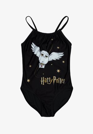 Black one-piece swimsuit with thin straps, featuring a white owl graphic and gold "Harry Potter" text, accented by stars and a wand design.