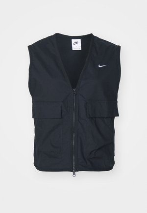 Schwarze ärmellose Weste mit einem Reißverschluss vorne, zwei vorderen Taschen und einem Nike-Logo auf der linken Brust; aus robustem Material gefertigt.
