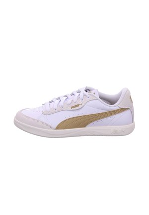 White and beige Puma sneaker with laces, perforated toe box, and logo on side and sole, shown in side profile on white background.