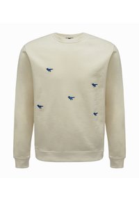 Felpa color crema con design di dinosauri ricamati blu. Collo rotondo classico, polsini e orlo a coste. Tessuto morbido con una texture liscia.