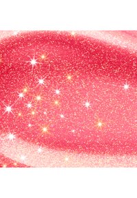 Superficie rosa brillante glitterata con riflessi luminosi scintillanti che creano un effetto luccicante simile a stelle su tutta la texture.