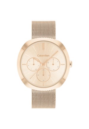 Reloj redondo en tono dorado con un dial texturizado de oro claro, tres subdiales y una correa de malla. Presenta marcadores de hora minimalistas y branding.