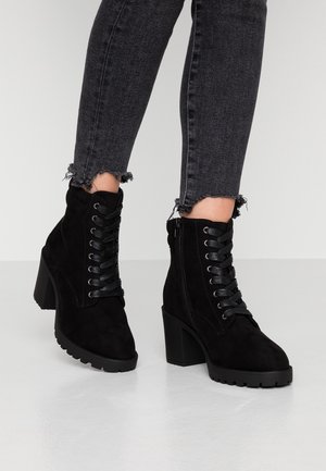 Plateaustøvletter - black