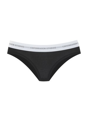 Black cotton bikini underwear features a white elastic waistband with "COPENHAGEN STUDIOS" printed in gray. Smooth texture, minimal design.