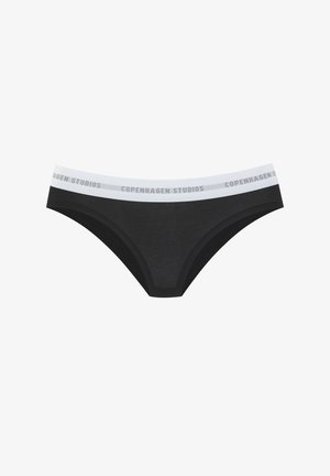 Black cotton bikini underwear features a white elastic waistband with "COPENHAGEN STUDIOS" printed in gray. Smooth texture, minimal design.