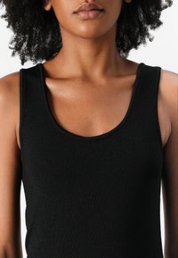 Calvin Klein Jeans NOVELTY SHEEN CROSS BACK DRESS - Obleka iz džersija - black