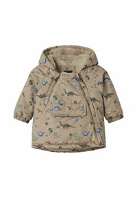 Veste à capuche beige avec imprime de dinosaure en bleu et vert, avec une poche avant et une doublure duveteuse pour plus de chaleur. Poignets élastiques inclus.