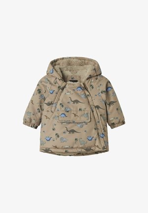 Giacca beige con cappuccio decorata con stampa di dinosauri in blu e verde, dotata di tasca frontale e fodera soffice per il calore. Include polsini elasticizzati.