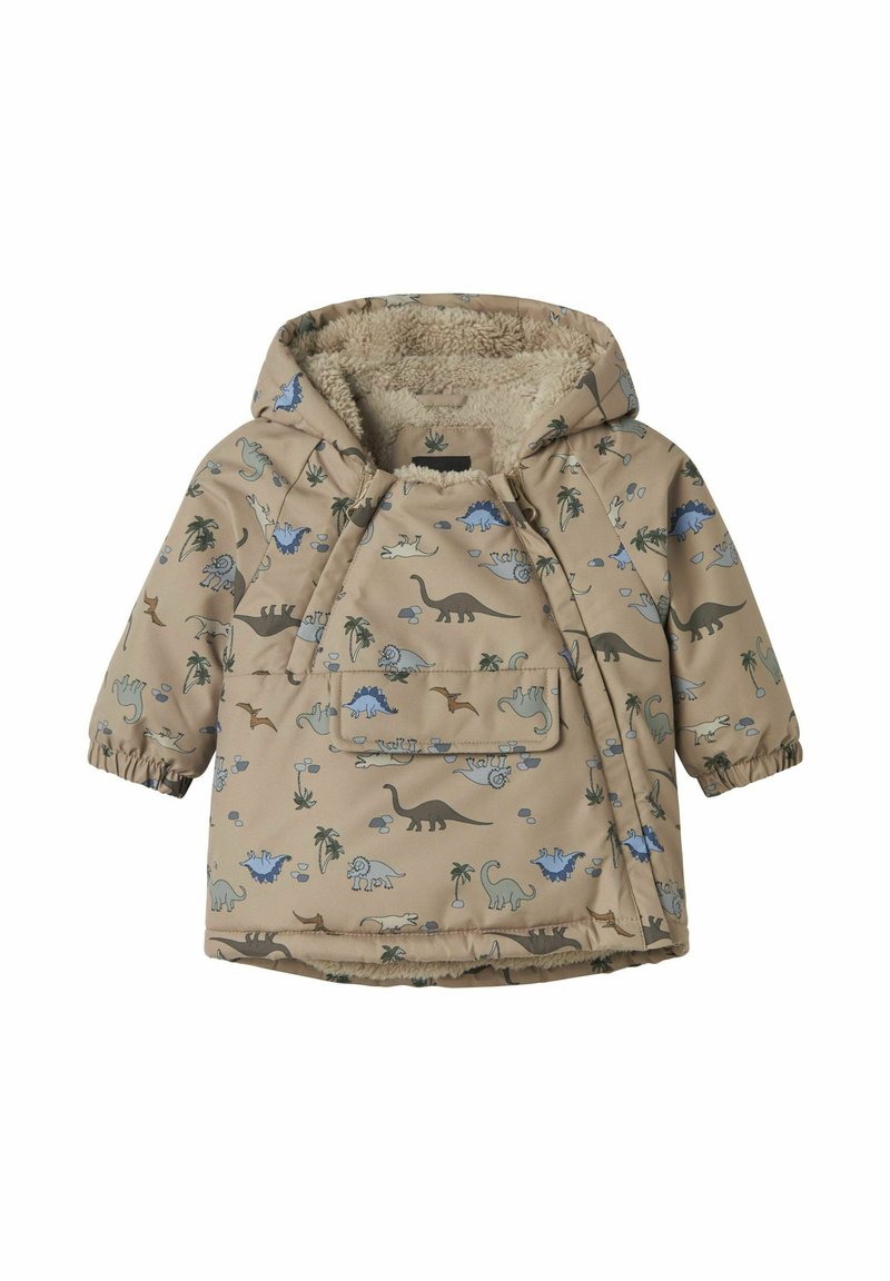 Veste à capuche beige avec imprime de dinosaure en bleu et vert, avec une poche avant et une doublure duveteuse pour plus de chaleur. Poignets élastiques inclus.
