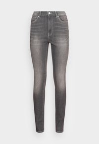 Jeans skinny em denim cinza escuro, com um design de cinco bolsos, desbotamento sutil e um fecho clássico com zíper e botão.