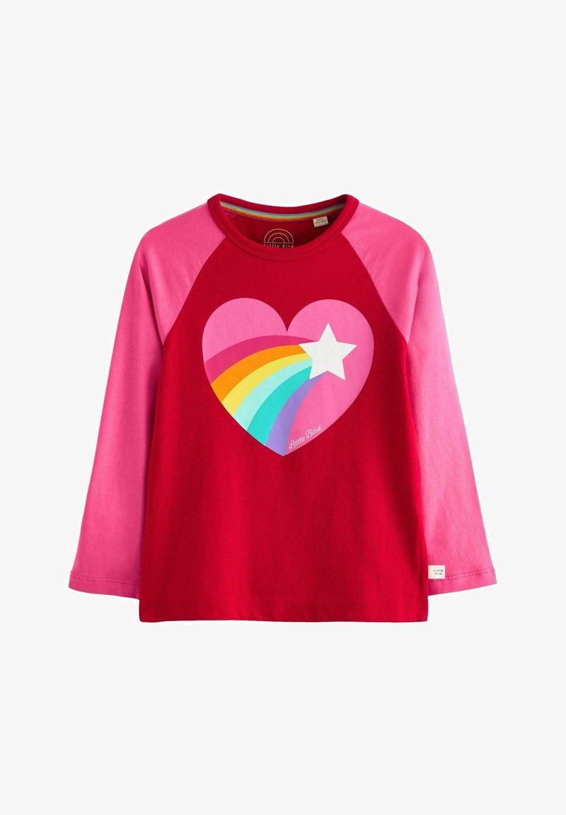Red long-sleeve shirt with pink raglan sleeves, featuring a large heart graphic with a rainbow and star in vibrant colors.