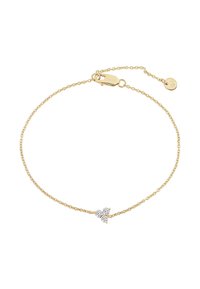 Pulsera de cadena dorada con dise ño retorcido. Cuenta con un pequeño adorno de cristal en forma de flor en el centro. Cierre de langosta.