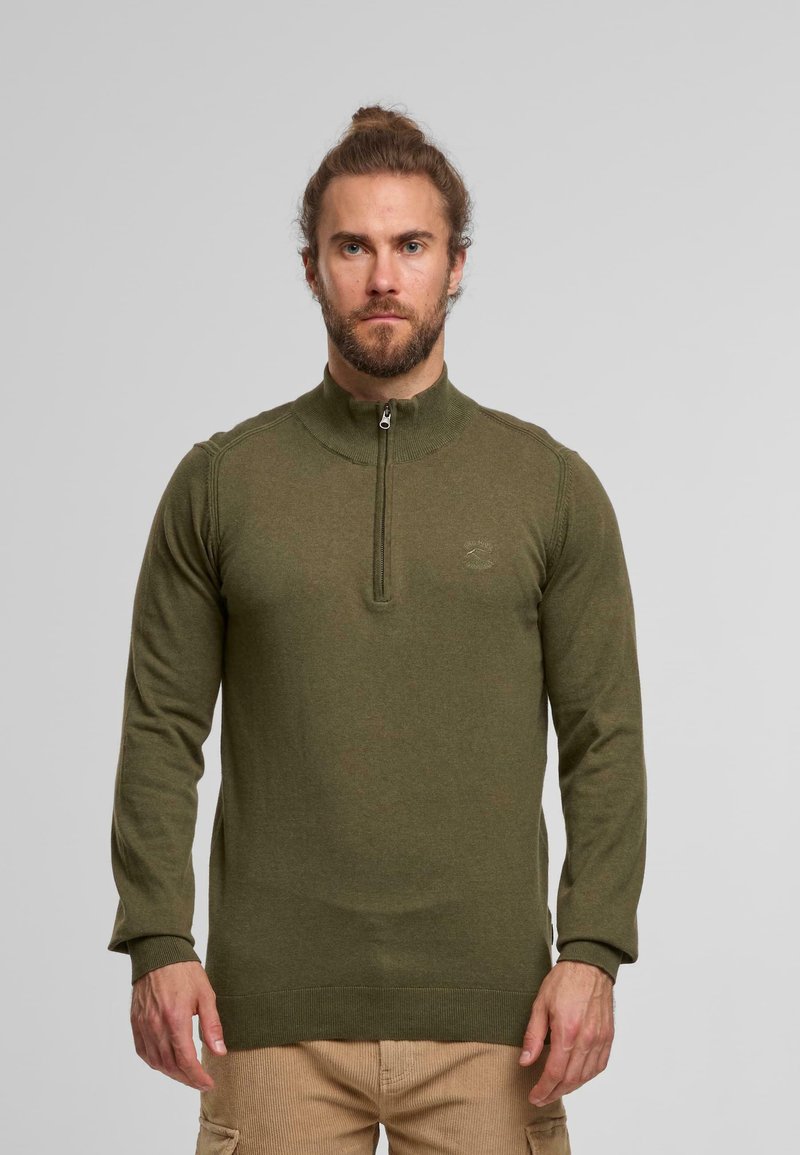 Grüner Reißverschluss-Pullover mit hohem Kragen, langen Ärmeln und gerippten Bündchen. Aus weichem Stoff gefertigt, verfügt er über ein dezentes Logo auf der Brust.