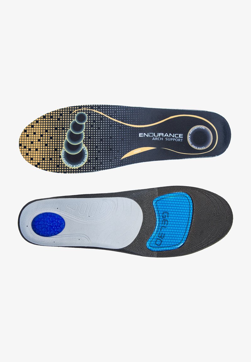 Semelle orthopédique avec une couche supérieure noire ornée d'un motif à pois et d'accents dorés ; couche inférieure grise avec des zones de rembourrage bleues.