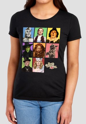 Nine colorful squares showing characters from The Wizard of Oz: Tin Man, Dorothy, Scarecrow, Wicked Witch, Cowardly Lion, Toto, Wizard, Glinda, and the logo.