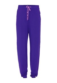 Fioletowe dresy z elastycznym paskiem i różowymi akcentami, z dwiema bocznymi kieszeniami oraz luźnym, swobodnym krojem. Miękka, gładka tkanina.