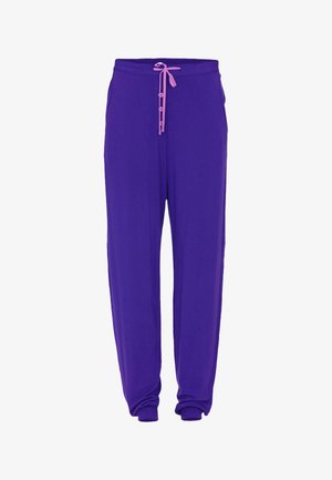 Paarse joggingsbroek met een trekkoord in de taille, voorzien van roze accenten, twee zijzakken en een losse, comfortabele pasvorm. Zachte, gladde stof.