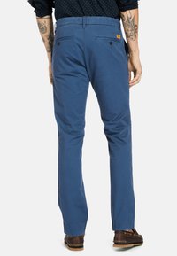 Timberland SARGENT LAKE STRETCH TWILL - Pantalones chinos - dark denim