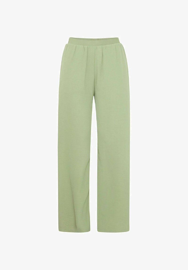 Pantaloni larghi verde chiaro con elastico in vita, caratterizzati da pieghe sottili e una texture morbida, progettati per comfort e libertà di movimento.