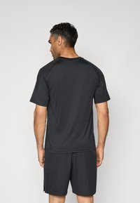 Champion TRAINING CREWNECK  - Camiseta deportiva - black