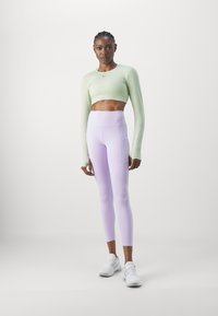 Nike Performance UNIVERSA 7/8 - Leggingek - lilac bloom