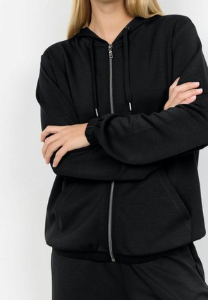 Tröja med dragkedja - black