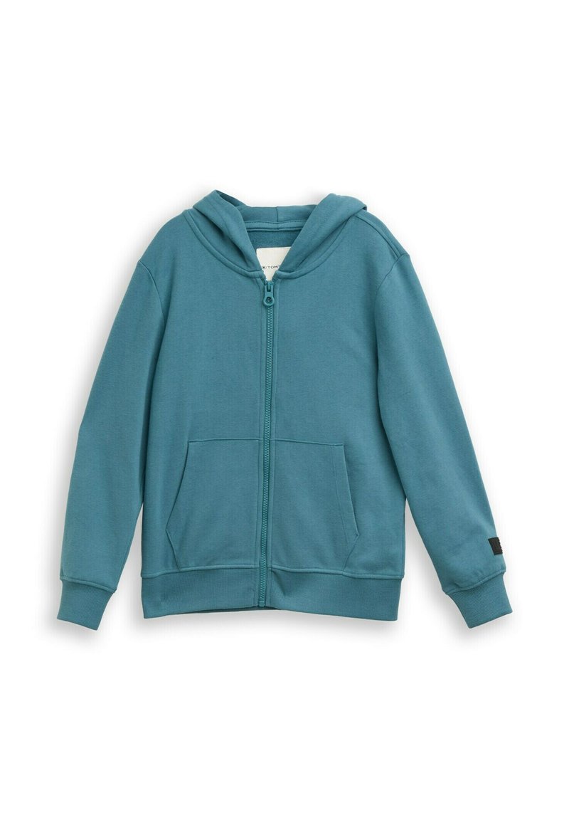 Sweat à capuche zippé couleur sarcelle en tissu doux, avec une poche avant, des poignets côtelés et une capuche  à cordon. Texture lisse et design décontracté.