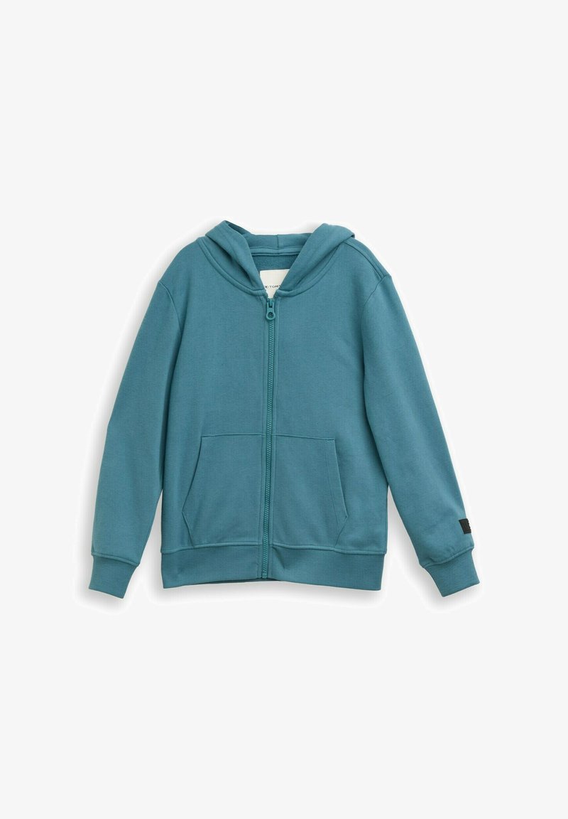 Turkizna jopa z zadrgo iz mehkega blaga, z žepom spredaj, rebrastimi manšetami in kapuco z vrvico. Gladek sijaj in priložnostna zasnova.