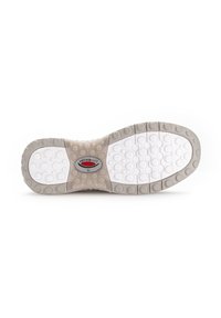 Semelle de chaussure blanche et beige avec une surface texturée. Présente des grips circulaires et un logo au centre. Bords lisses et forme arrondie.