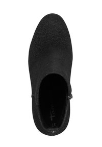 Stivale alla caviglia nero con tomaia in tessuto elasticizzato, punta affusolata e texture glitterata. Dettaglio con zip laterale per una facile calzata. Numero 37.