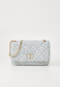 Quilted handbag in light blue fabric with a gold chain strap. Features a logo accent on the front and a rectangular shape.