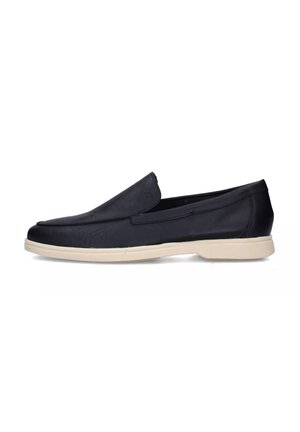 Scarpa slip-on nera in pelle con profilo basso, tomaia strutturata e suola beige a contrasto. Dettagli delle cuciture lungo i lati.