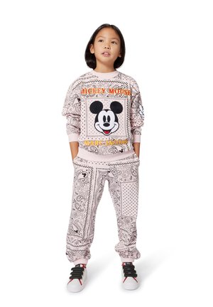 Mickey Mouse sweatshirt en bijpassende broek in lichtroze, met paisleypatronen, stippen en zwarte accenten.