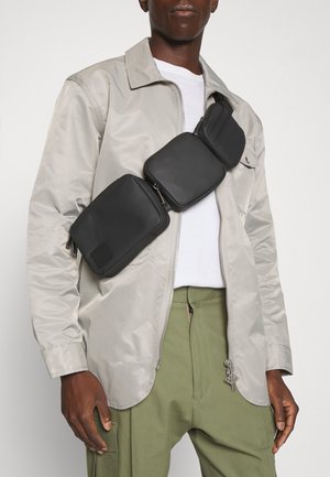 ADVANCE CROSSBODY UNISEX - Skulderveske - black