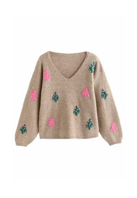Beige V-ringad tröja med långa ärmar, dekorerad med rosa och gröna trädformade mönster med små runda detaljer.