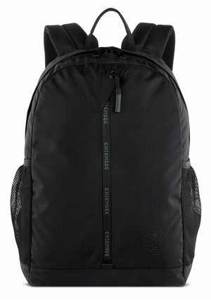 Black backpack made from textured fabric, with padded straps, mesh side pockets, and subtle logo detailing on the front and zipper.