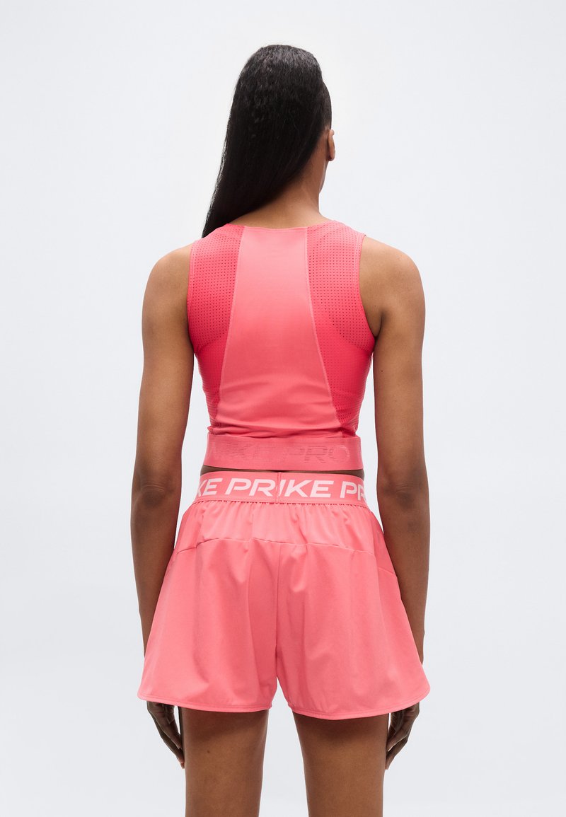 Nike Performance TANK - Top - sea coral/bleached coral/white
