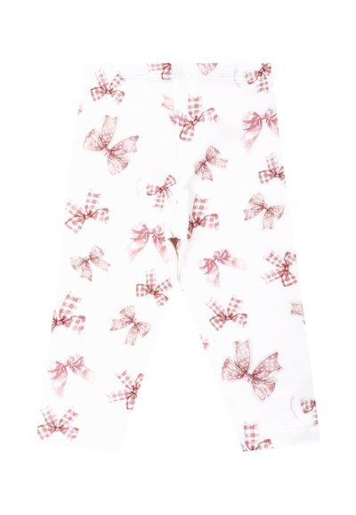Leggings van zacht wit materiaal met een herhaald patroon van roze strikken, inclusief stippen en gingham ontwerpen, op een gladde textuur.