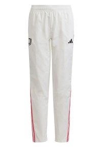 Witte joggingshorts met een elastische tailleband, voorzien van zwarte logo's en roze zijsstripes. Gemaakt van lichte, gestructureerde stof.